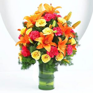 Festive Blaze – Lilies Roses Carnations Vase